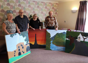 Residents and staff at MHA Amathea care home in Workington have been enjoying views of local landmarks, having been given several paintings created by students at a nearby college.